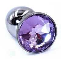 Серебристая анальная пробка с фиолетовым стразом - 7 см фиолетовый 